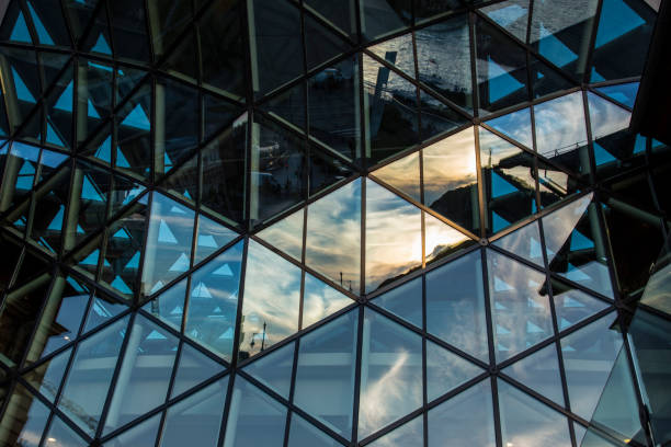 istock Modern office building or shopping center in Budapest, windows with reflections 824609578