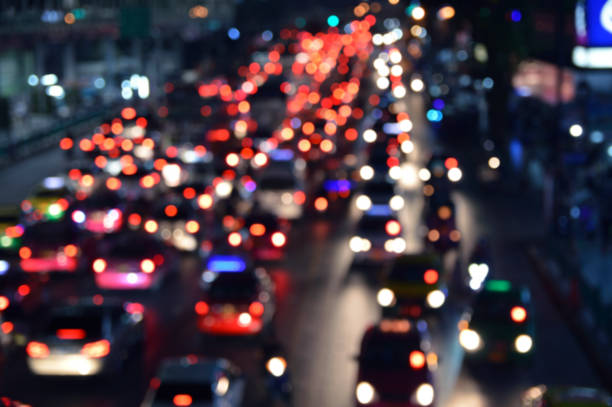 istock Blurred colourful night light city with cars, Abstract background 824612016