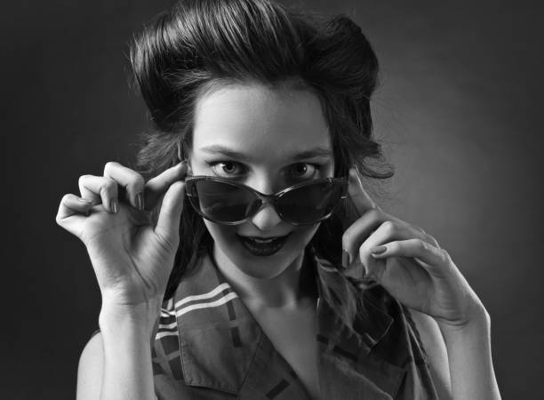 istock young beautiful woman with sunglasses 824612284