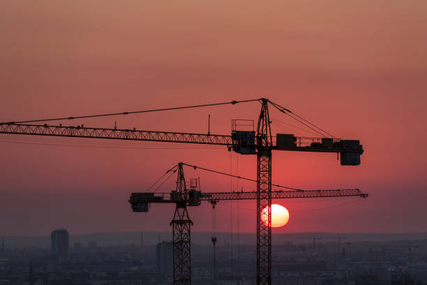 istock Crane over the urban landscape sunset 824614314