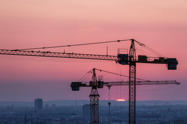 istock Crane over the urban landscape sunset 824614316