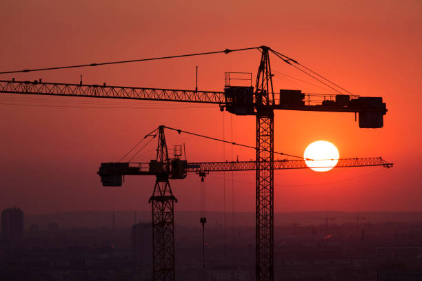 istock Crane over the urban landscape sunset 824614330
