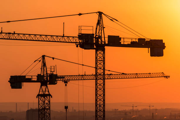 istock Crane over the urban landscape sunset 824614348
