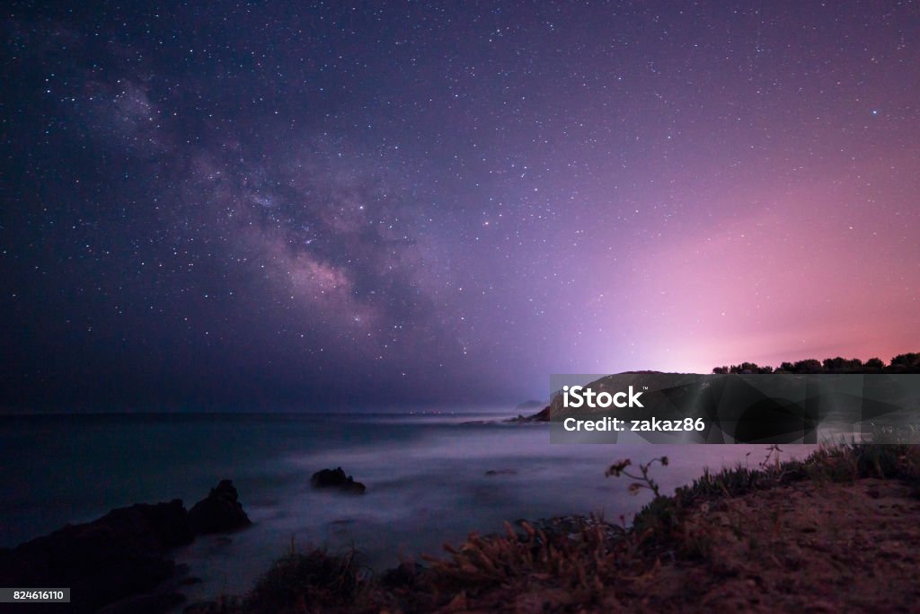 Milky way in the sky of Sardinia A beautiful milky way in the sky of Sardinia in a day of summerA beautiful milky way in the sky of Sardinia in a day of summer Night Stock Photo