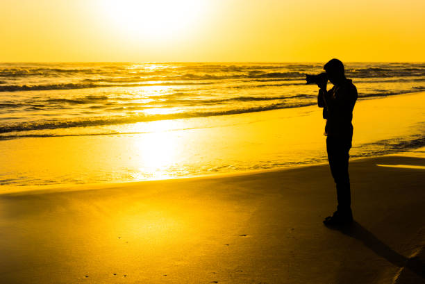 photographer woman on the beach