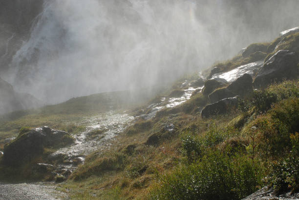 istock Water spray of river rapids nearby the Briksdal Glacier 824620764