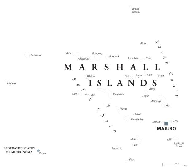 Marshall Islands political map Marshall Islands political map with capital Majuro. Republic and country in the Pacific Ocean consisting of coral atolls and islands. English labeling. Gray illustration on white background. Vector. bikini atoll stock illustrations