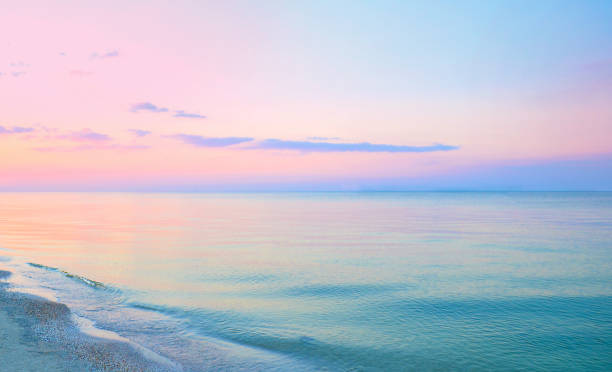 istock Colorful sea beach sunrise. 824621736