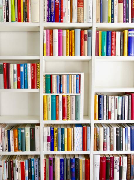 istock Filled books shelves and some parts empty: space for copy 824628410