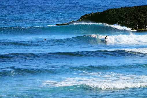 The blue ocean water crashing upon the majestic reef creates one of the best surf destinations in the world.