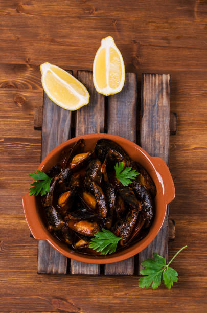 istock Mussels in tomato sauce 824630294