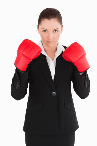 istock Charming woman wearing some boxing gloves 824631562