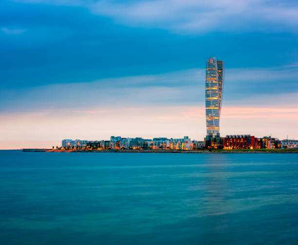 Skyline of Malmo Sweden with Famous Turning Torso Building Skyline of Malmo Sweden with Famous Turning Torso Building, captured around sunset. oresund region photos stock pictures, royalty-free photos & images