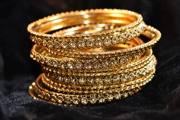 Fancy golden bracelet/ bangles for woman fashion closup image