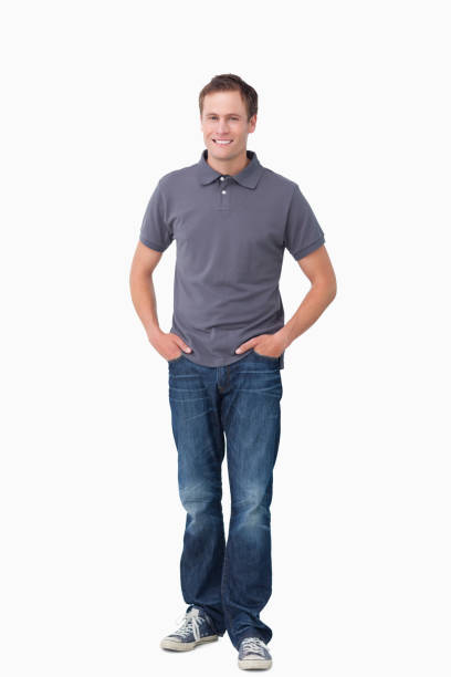 istock Smiling young man with hands in his pockets 824635296