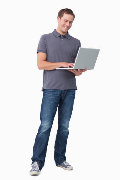 istock Smiling young man working on his laptop 824635450