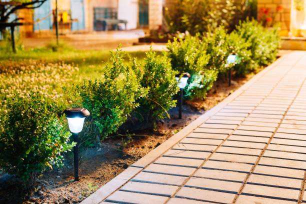 istock Small Solar Garden Light, Lantern In Flower Bed. Garden Design. Solar Powered Lamp 824637350