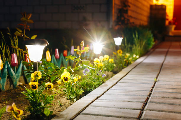 istock Small Solar Garden Light, Lantern In Flower Bed. Garden Design. Solar Powered Lamp 824637378