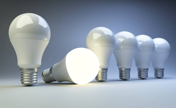 istock Row of light bulbs on blue background. Creative idea concepts. 824638788