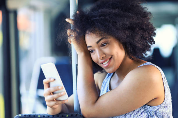 istock Traveling with bus and using smart phone 824641272
