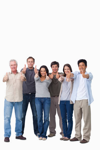 istock Smiling group giving thumbs up 824642556