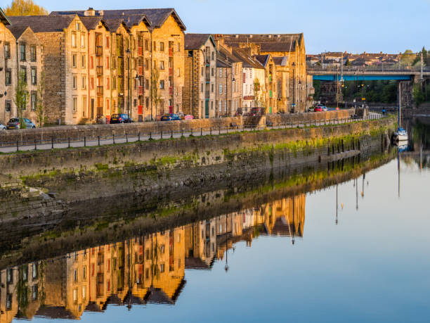 istock Lancaster Quayside from Millenium Bridge across River Lune in Lancashire England on a sunny morning 824647512