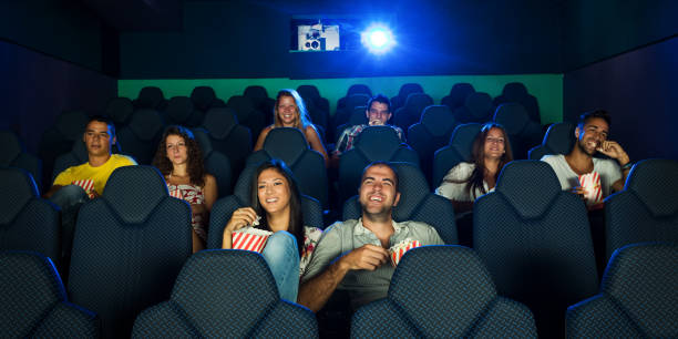istock People in cinema 824648316
