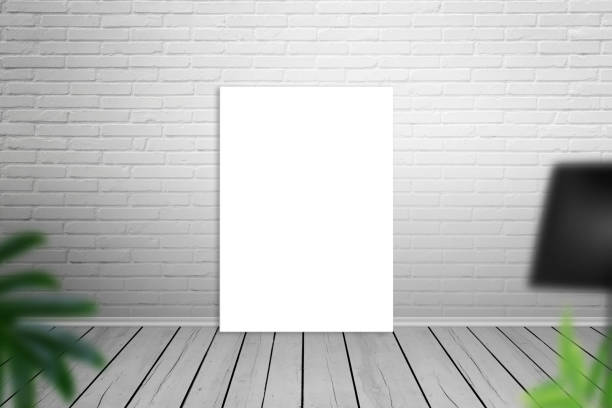 istock Empty art canvas leaning on brick wall. Isolated for mockup. 824649040