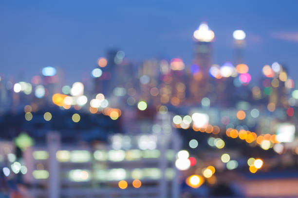 istock Blue twilight over night blurred bokeh light city downtown 824649194