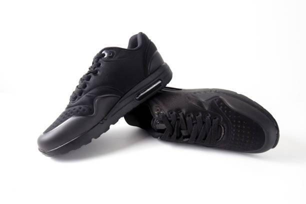 istock Male Black Sneaker on White Background. 824653126