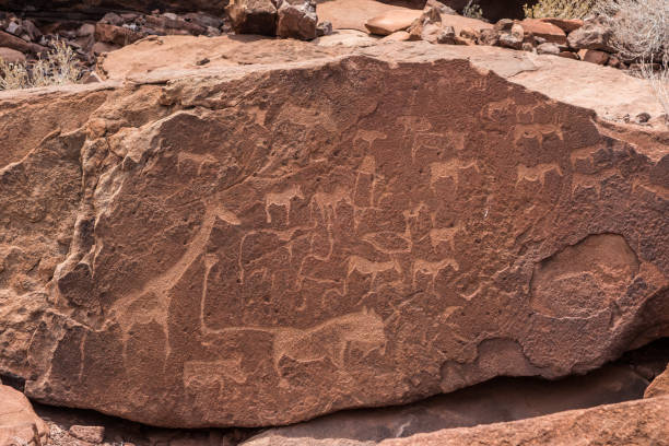 istock Sandstone engravings in a stone at Twyfelfontein 824667438