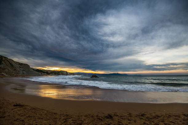 istock Clouds in the sky in Sopelana beach 824667644