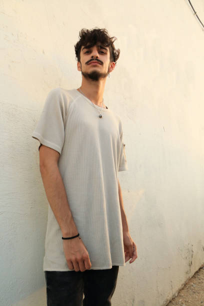 istock Attractive young man with beard and mustache posing 824667790