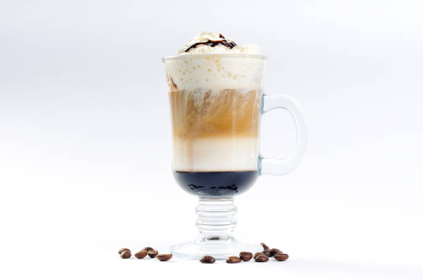 istock cup of coffee with cream and liqueur poured layers. 824668926