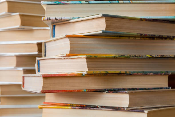 istock A stack of books in multicolored covers in the library or bookstore 824676922