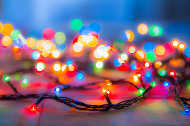 istock Colored lights Christmas garlands. Colorful abstract background 824676966