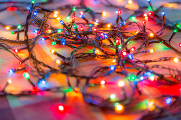 istock Colored lights Christmas garlands. Colorful abstract background 824676974