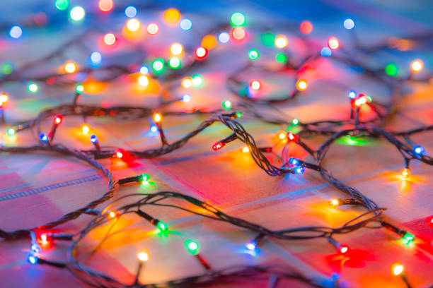 istock Colored lights Christmas garlands. Colorful abstract background 824676982