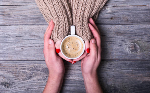 istock Woman holding coffee 824677298