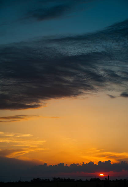 Cirrus clouds on the sunset stock photo