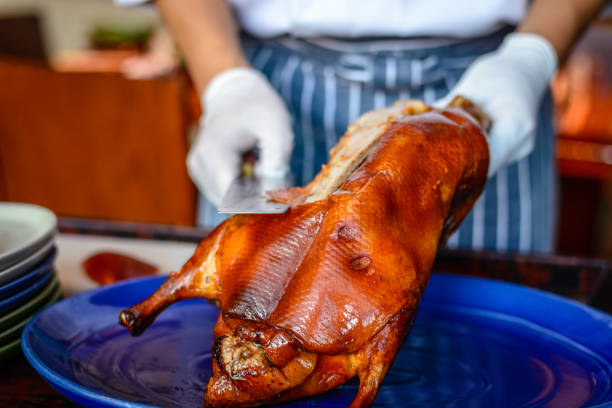 istock Chinese Chef chopping serving  Peking duck 824693600