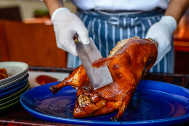 istock Chinese Chef chopping serving  Peking duck 824693672