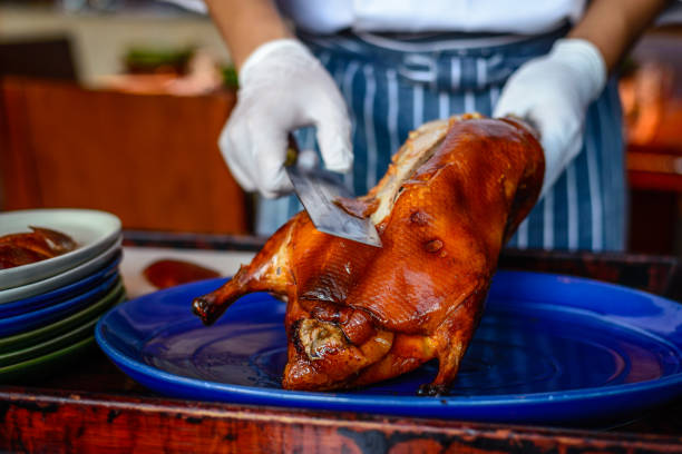 istock Chinese Chef chopping serving  Peking duck 824693902