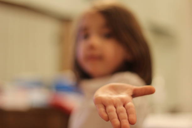 istock The girl show her own hand 824696232