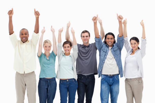istock People raising their arms with their thumbsup 824696638