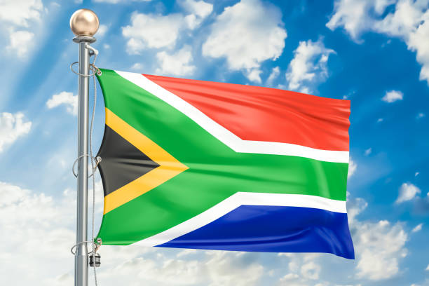 istock South Africa flag waving in blue cloudy sky, 3D rendering 824699468
