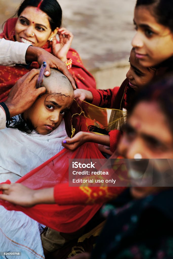 The Hair Stylist Cuts The Boys Hair On The Side Of The Varanasi Ganges  Stock Photo - Download Image Now - iStock