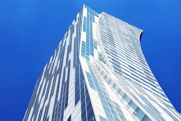 istock Modern building.Modern office building with facade of glass 824703246
