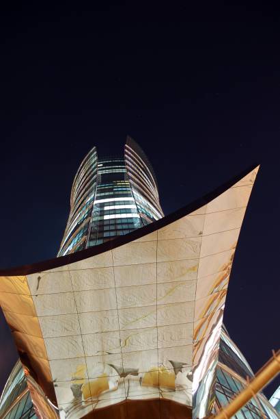 istock Modern building.Modern office building with facade of glass 824703530