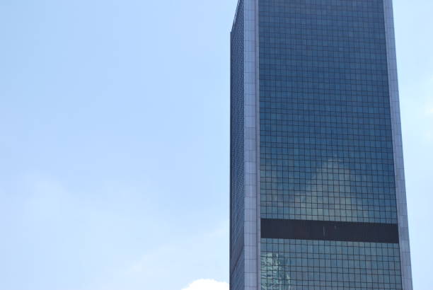 istock Modern building.Modern office building with facade of glass 824706120